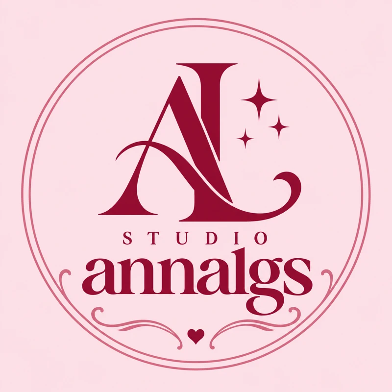 Logo Studio Annalgs: monograma AL com estrelas e coração